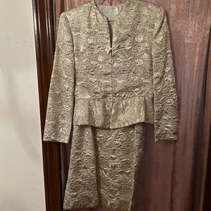 Beautiful gold/shiny suit. Mary McFadden-Saks.